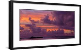 Seascape with rock formations silhouetted under moody sky at sunset, La Digue, Seychelles-Panoramic Images-Framed Photographic Print