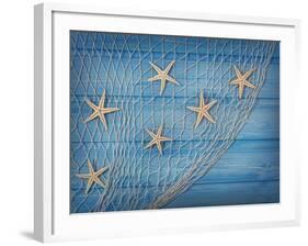 Seastars on the Fishing Net on a Blue Background-egal-Framed Photographic Print