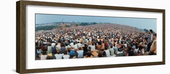 Seated Crowd Listening to Musicians Perform at Woodstock Music Festival-John Dominis-Framed Photographic Print