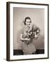 Seated Girl Holding Flowers-Philip Gendreau-Framed Photographic Print