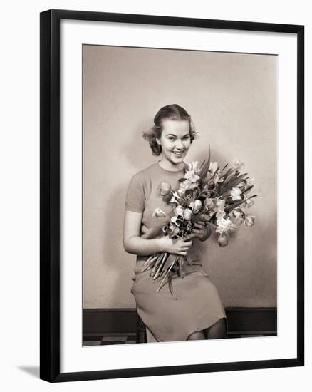 Seated Girl Holding Flowers-Philip Gendreau-Framed Photographic Print