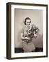 Seated Girl Holding Flowers-Philip Gendreau-Framed Photographic Print