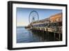 Seattle Great Wheel on Pier 57 in the foreground in late afternoon sunshine. Seattle, Washington St-Frank Fell-Framed Photographic Print