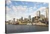 Seattle waterfront and skyline. Clouds reflected in glass buildings-Trish Drury-Stretched Canvas