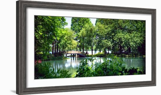 Secluded Stone Bridge Surrounded by Lush Landscape at West Lake, Hangzhou, Zhejiang, China-Andreas Brandl-Framed Photographic Print