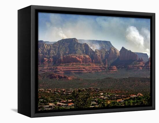 Sedona, Ariz. is Backdropped by the Brins Fire Buring Atop the Red Rocks-null-Framed Stretched Canvas