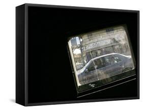 Seen Through the Bulletproof Window of a U.S. Humvee, Iraqis Smile from Their Car-null-Framed Stretched Canvas