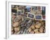 Selection of Corsican sausages and hams for sale at open-air market in Place Foch, Ajaccio-David Tomlinson-Framed Photographic Print