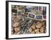 Selection of Corsican sausages and hams for sale at open-air market in Place Foch, Ajaccio-David Tomlinson-Framed Photographic Print