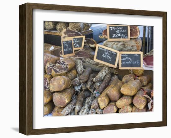 Selection of Corsican sausages and hams for sale at open-air market in Place Foch, Ajaccio-David Tomlinson-Framed Photographic Print