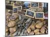 Selection of Corsican sausages and hams for sale at open-air market in Place Foch, Ajaccio-David Tomlinson-Mounted Photographic Print