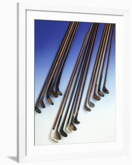 Selection of walking sticks shaped like golf clubs, 1900-1925-Unknown-Framed Giclee Print