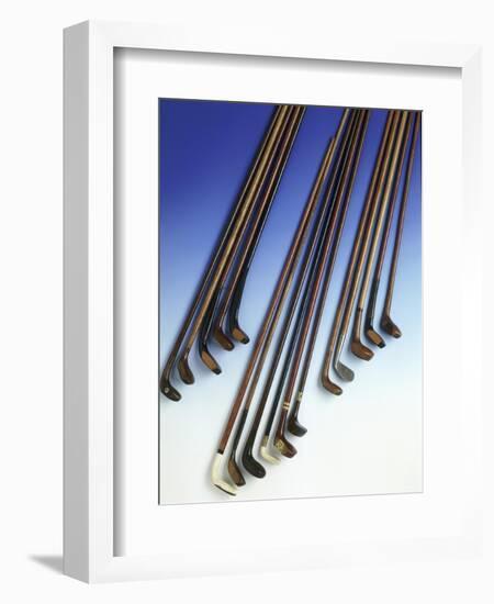 Selection of walking sticks shaped like golf clubs, 1900-1925-Unknown-Framed Giclee Print