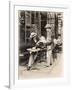Seller of Statues on a Cafe Terrace, Paris, 1910-null-Framed Giclee Print