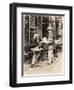Seller of Statues on a Cafe Terrace, Paris, 1910-null-Framed Giclee Print