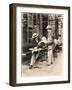 Seller of Statues on a Cafe Terrace, Paris, 1910-null-Framed Giclee Print