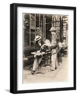 Seller of Statues on a Cafe Terrace, Paris, 1910-null-Framed Giclee Print