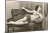 Semi-nude Woman on Cane Divan Looking in Mirror-null-Mounted Art Print