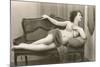 Semi-nude Woman on Cane Divan Looking in Mirror-null-Mounted Art Print
