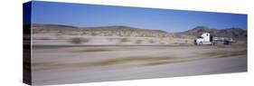 Semi-Truck on a Highway, Blurred Motion-null-Stretched Canvas