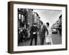 Sen. Jack Kennedy with Jackie, Walking Down Middle of the Street During Senate Re-Election Campaign-Carl Mydans-Framed Photographic Print