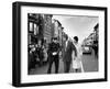 Sen. Jack Kennedy with Jackie, Walking Down Middle of the Street During Senate Re-Election Campaign-Carl Mydans-Framed Photographic Print