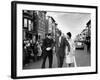 Sen. Jack Kennedy with Jackie, Walking Down Middle of the Street During Senate Re-Election Campaign-Carl Mydans-Framed Photographic Print