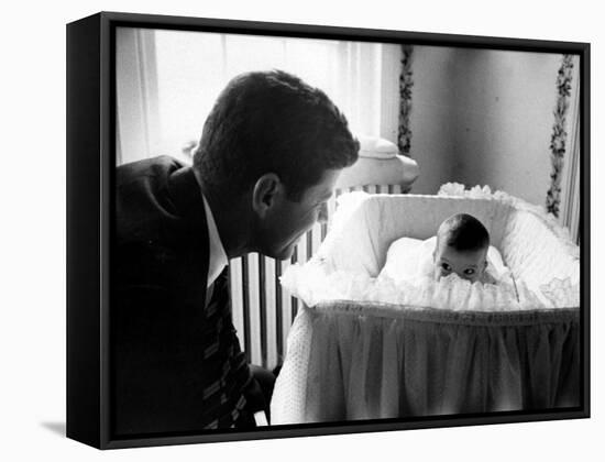 Sen. John F. Kennedy Playing Peek-A-Boo with His Daughter Caroline in Her Crib-Ed Clark-Framed Stretched Canvas