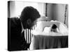 Sen. John F. Kennedy Playing Peek-A-Boo with His Daughter Caroline in Her Crib-Ed Clark-Stretched Canvas