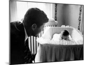 Sen. John F. Kennedy Playing Peek-A-Boo with His Daughter Caroline in Her Crib-Ed Clark-Mounted Photographic Print