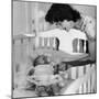 Sen. John Kennedy's Wife Jacqueline Offering Baby Caroline a Silver Rattle at their Georgetown Home-Nina Leen-Mounted Premium Photographic Print