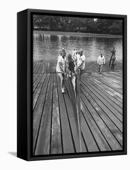 Sen. Leverett Saltonstall, Helping His Crew Members Carry the Canoe on Deck at Harvard-Yale Joel-Framed Stretched Canvas