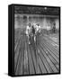 Sen. Leverett Saltonstall, Helping His Crew Members Carry the Canoe on Deck at Harvard-Yale Joel-Framed Stretched Canvas