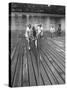 Sen. Leverett Saltonstall, Helping His Crew Members Carry the Canoe on Deck at Harvard-Yale Joel-Stretched Canvas