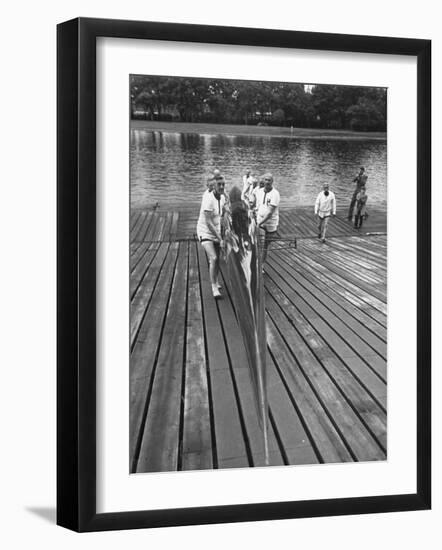 Sen. Leverett Saltonstall, Helping His Crew Members Carry the Canoe on Deck at Harvard-Yale Joel-Framed Photographic Print