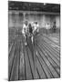 Sen. Leverett Saltonstall, Helping His Crew Members Carry the Canoe on Deck at Harvard-Yale Joel-Mounted Photographic Print