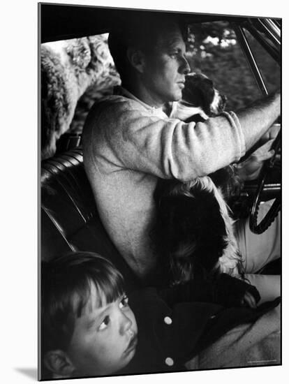 Sen. Robert Kennedy Driving His Car with Pet Springer Spaniel over His Lap and Son Max Beside Him-Bill Eppridge-Mounted Premium Photographic Print