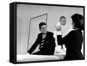 Senator Jack Kennedy Watching with Delight as His Wife Jackie Holds Up their Daughter Caroline-Ed Clark-Framed Stretched Canvas