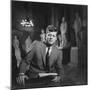 Senator John F. Kennedy Seated in Museum W. Statues-null-Mounted Photographic Print