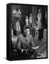 Senator John F. Kennedy Seated in Museum with Statues-Hank Walker-Framed Stretched Canvas