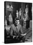 Senator John F. Kennedy Seated in Museum with Statues-Hank Walker-Stretched Canvas