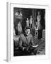 Senator John F. Kennedy Seated in Museum with Statues-Hank Walker-Framed Photographic Print