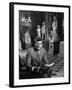 Senator John F. Kennedy Seated in Museum with Statues-Hank Walker-Framed Photographic Print