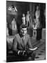 Senator John F. Kennedy Seated in Museum with Statues-Hank Walker-Mounted Photographic Print