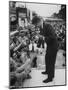 Senator John F. Kennedy Speaking on the Hood of a Car During a Campaign Tour-Ed Clark-Mounted Photographic Print