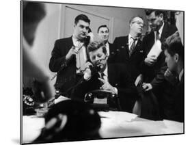 Senator John F. Kennedy Talking on the Phone Surrounded by Aides During the Primary Elections-Stan Wayman-Mounted Photographic Print