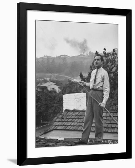 Senator Richard M. Nixon on Roof of Home in Los Angeles, Putting Out Fires Caused by Brush Blaze-Allan Grant-Framed Photographic Print