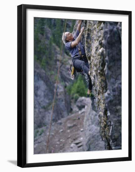 Senior Man Rock Climbing-null-Framed Premium Photographic Print