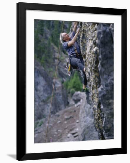 Senior Man Rock Climbing-null-Framed Photographic Print