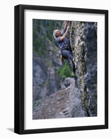 Senior Man Rock Climbing-null-Framed Photographic Print